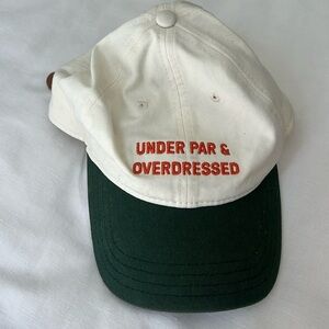 Byrdie social wear hat “under par and overdressed” motto
